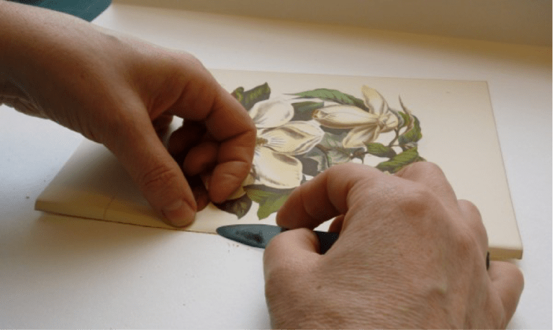 Although brittle and friable the residue still needed to be carefully scraped off