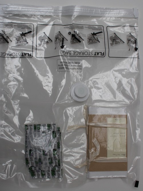 Mould-damaged book in vaccum bag showing seal