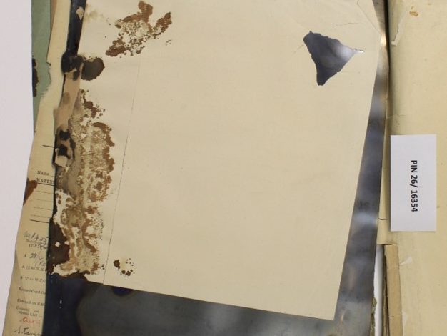 Fig. 2 – A document damaged through contact with a degraded cellulose nitrate x-ray radiograph