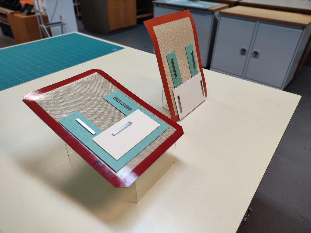 Fig. 7 – Inclined stands for assembling the broken pieces of glass