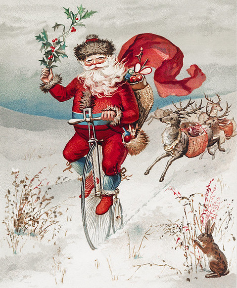 Fig. 4 - Vintage Santa Claus riding an 'Ordinary' or 'Penny Farthing' bicycle
