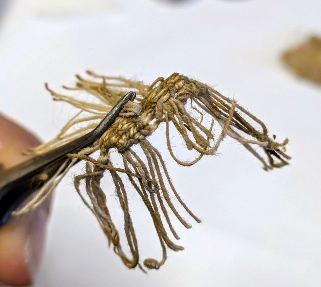 The detached endband before washing