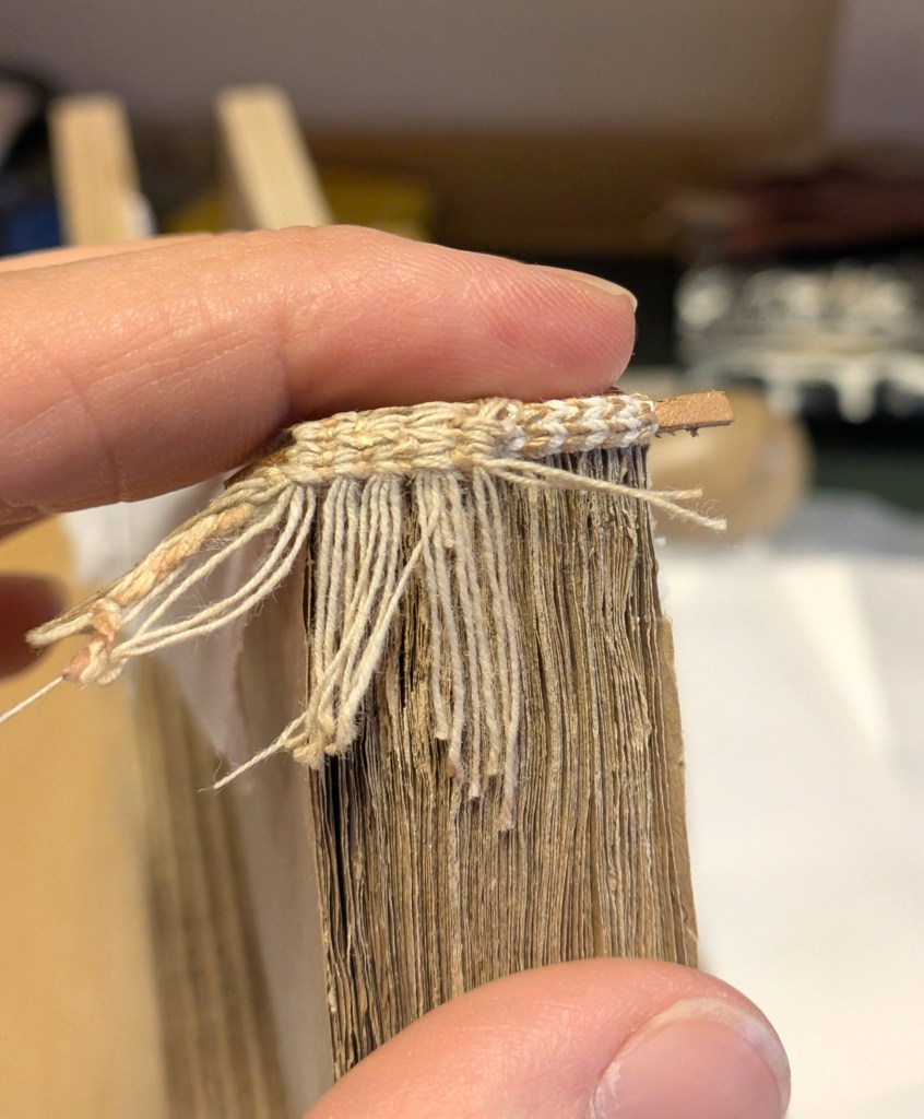 Reattaching the endband to its original position and reconstructing the missing part